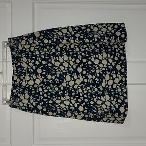 Green and cream patterned skirt